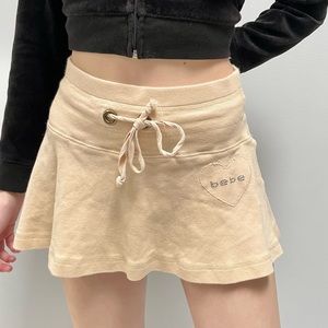 Bebe y2k 2000s tan mini skirt
